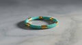 Pulsera de Hematitas Doradas Engomadas y Naturales